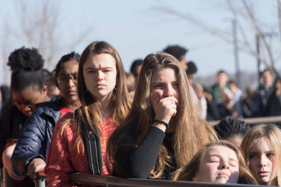 Students listen to the speeches given during the March 14 walkout.