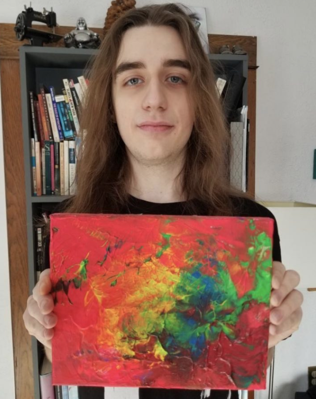 Duin holds up one of his favourite paintings, titled “Light Up The Day.”