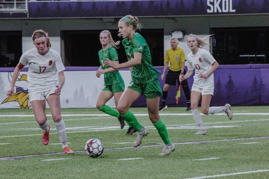 With the help of her youth soccer coaches, Engle was able to combine this love and passion for her sport with commitment and hard work, landing herself on the Edina High School varsity soccer team for their 2021 season in her freshman year. 