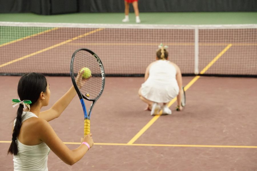 Photo By: Olivia Wegmann-Krider. Two of Edinas Girls Tennis Team compete at the MSHSL State AA Tournament.