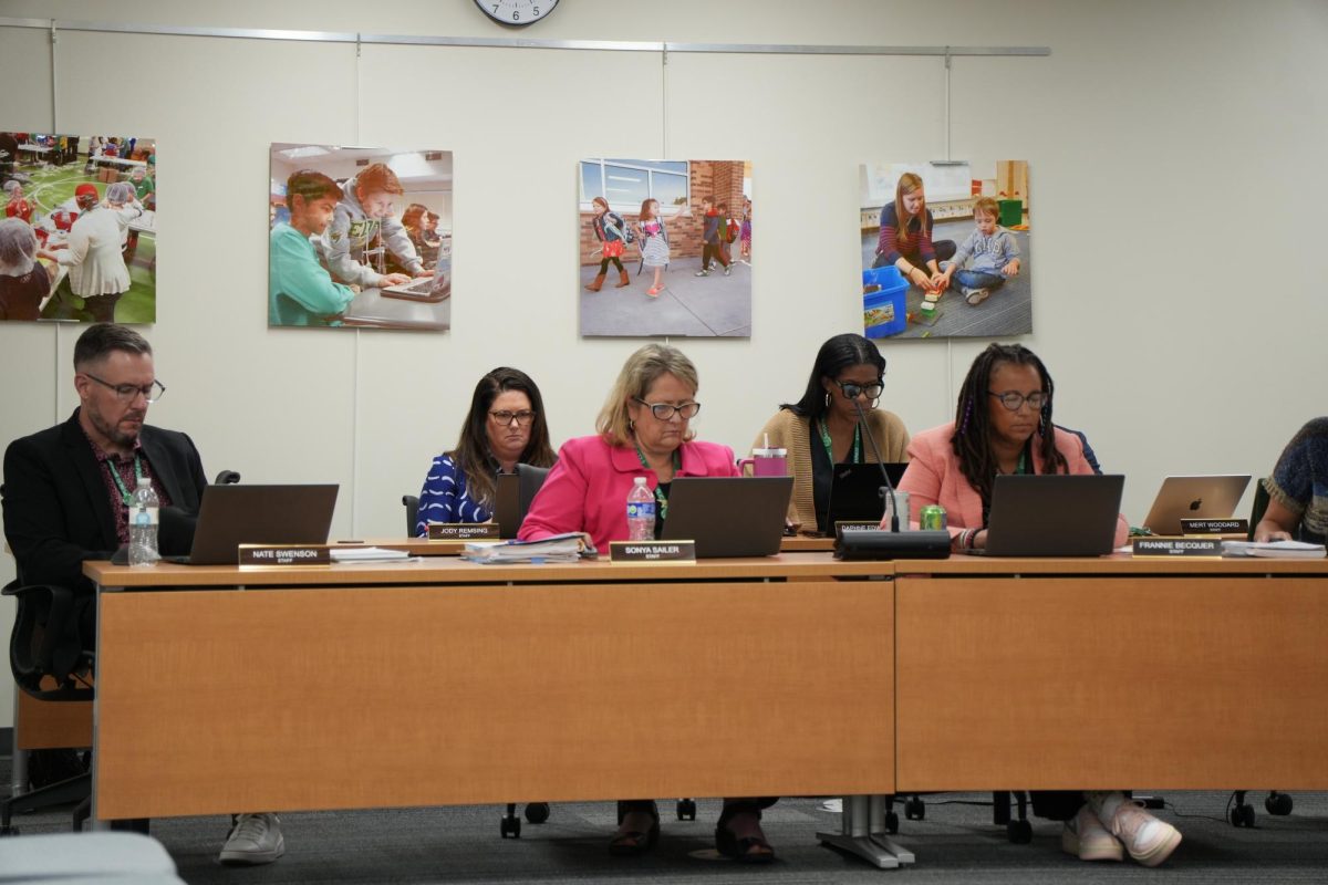 Edina Public Schools cabinet members listen to the districts first school board meeting of the school year. 