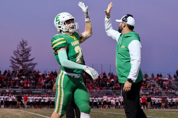 On Sept. 6, the Edina Boys' Football team played Eden Prairie at Kuhlman Field. After a play, Coach Josh Flug and Chase Bjorgaard celebrated with a high five.