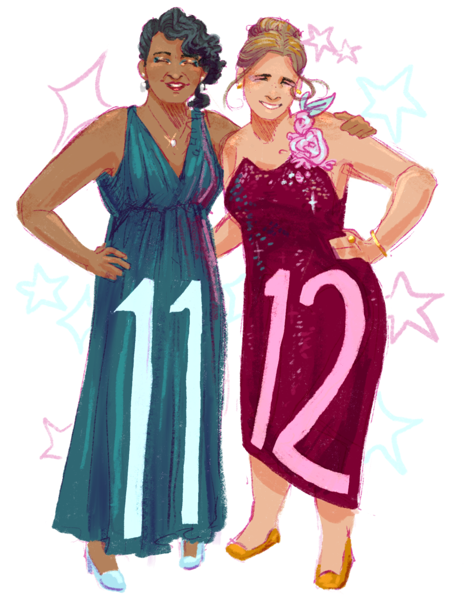 Two women dress formally for prom, sporting their grade levels on their dresses. 