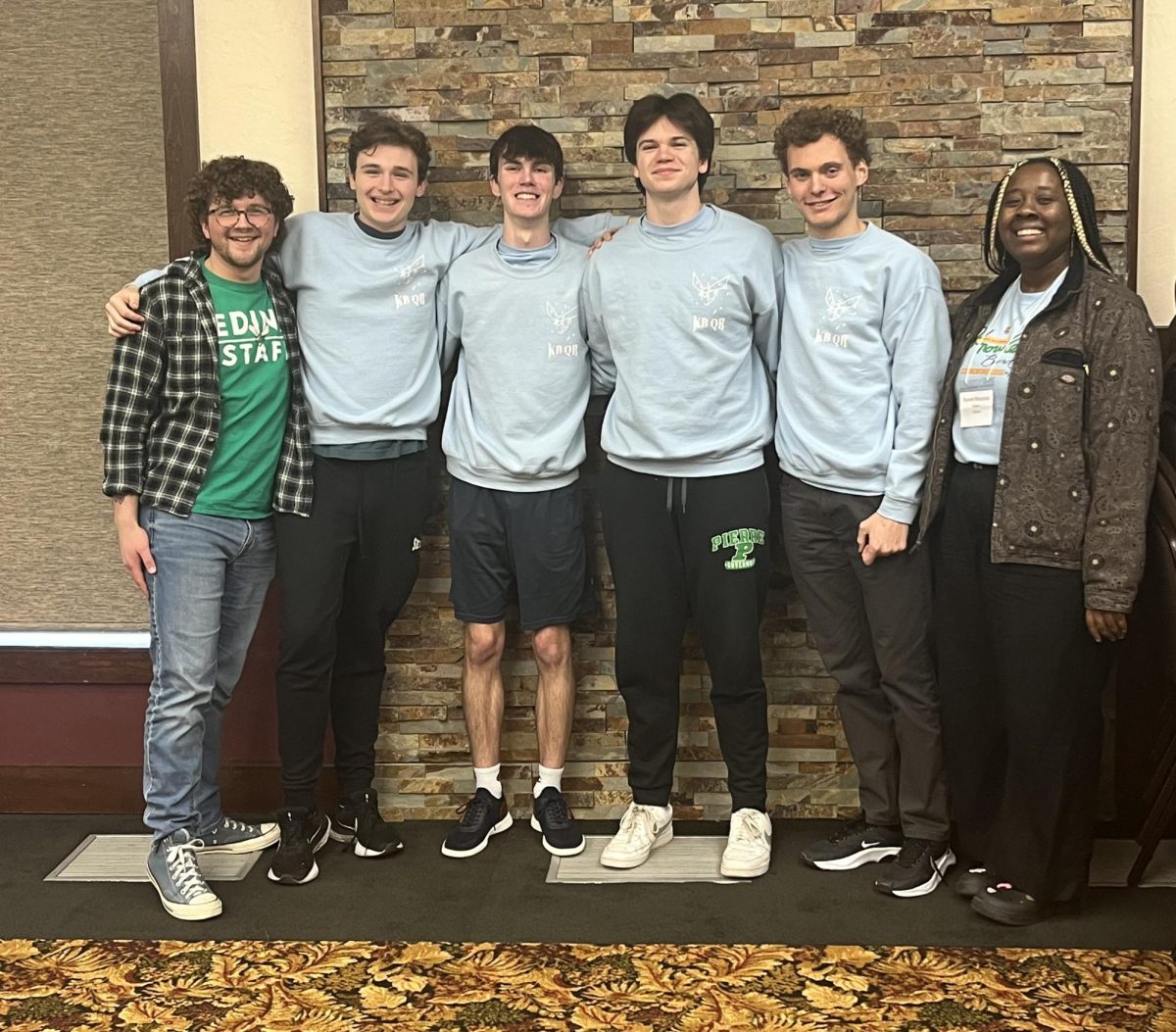 Edina’s knowledge bowl team—advisor Mr. Ward, Beckett Pursey, Jack O Brien, Jo Adam, Aidan Sneller, and advisor Ms. Banjoko (left to right)—win with a score of 143.5. Courtesy of Jack O'Brien.