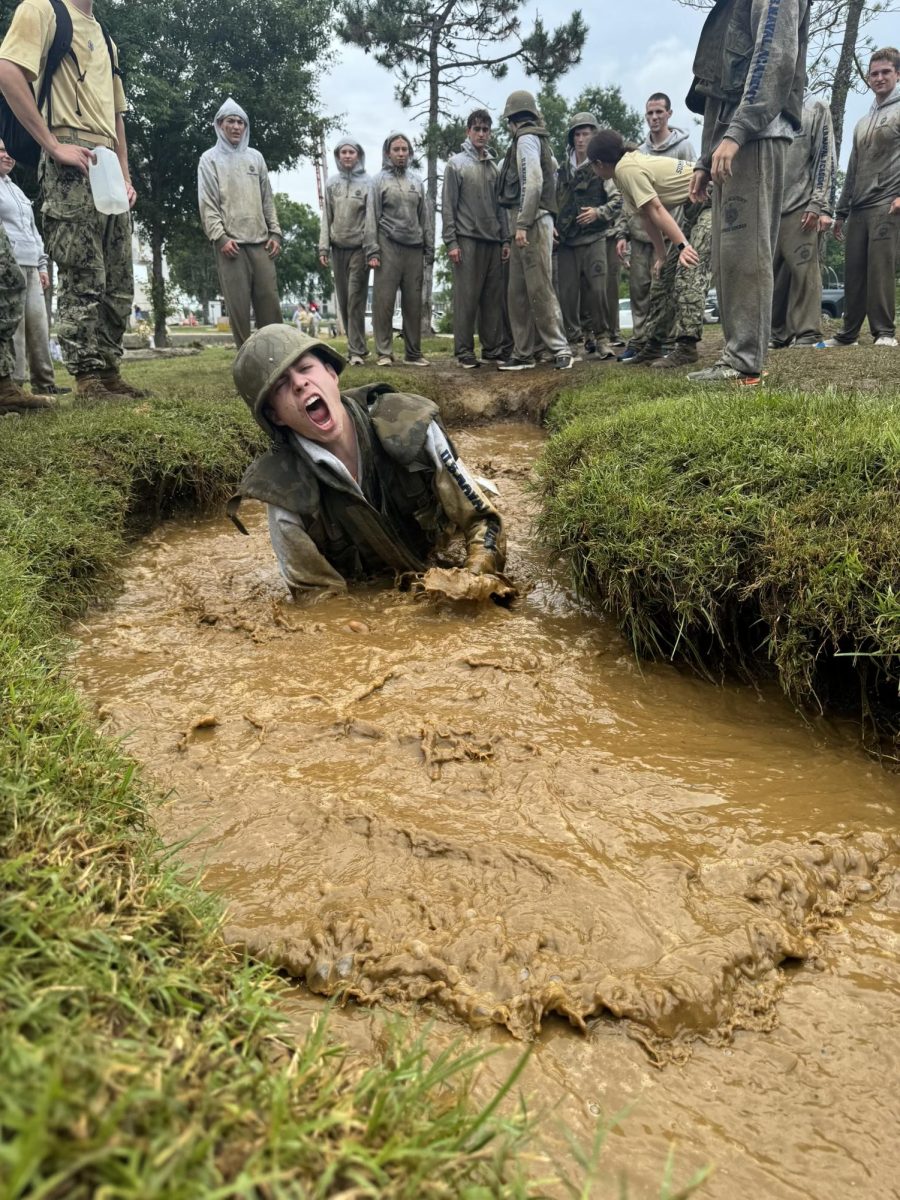 At the Summer Seminar, Howard had to learn how to belly-crawl through trenches. Courtesy of Michael Howard.