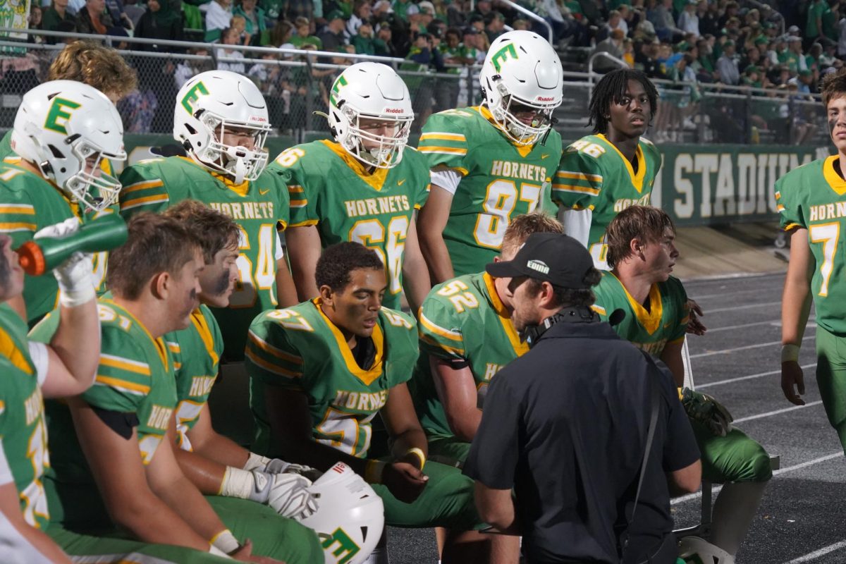 Edina Football players reconvene during the homecoming game.