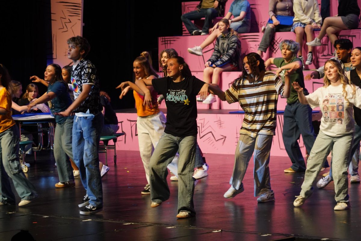 Actors danced around on stage, showing off moves crafted by choreographer and director Ella Williams.
