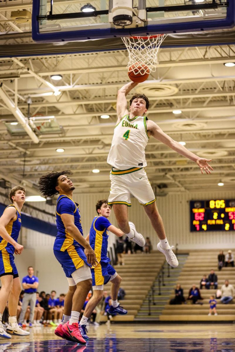 Edina Boys' Basketball Junior Captain Vincent Cronin averages over 20 points per game as Edina's leading scorer. Courtesy of Brennan Schachtner / @brennansphoto
