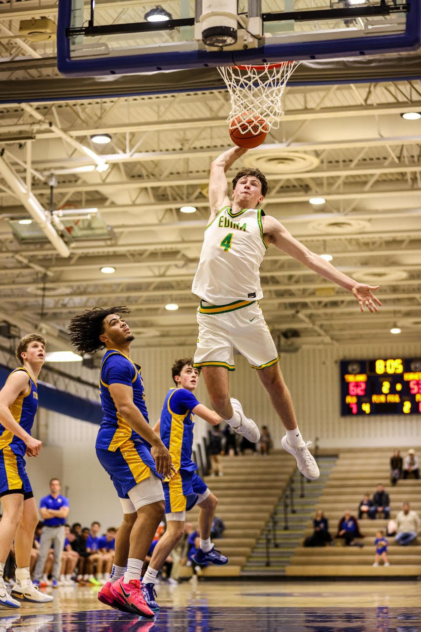 Edina Boys' Basketball Junior Captain Vincent Cronin averages over 20 points per game as Edina's leading scorer. Courtesy of Brennan Schachtner / @brennansphoto
