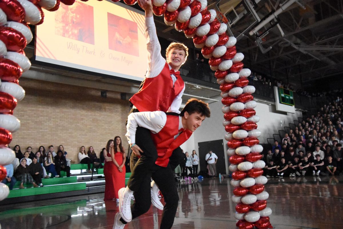 Willy Thurk and Owen Meyer danced to hype up the students and teachers at the Sweethearts coronation.